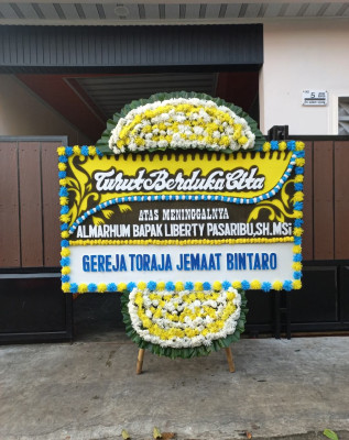 Papan Bunga Duka di Perina